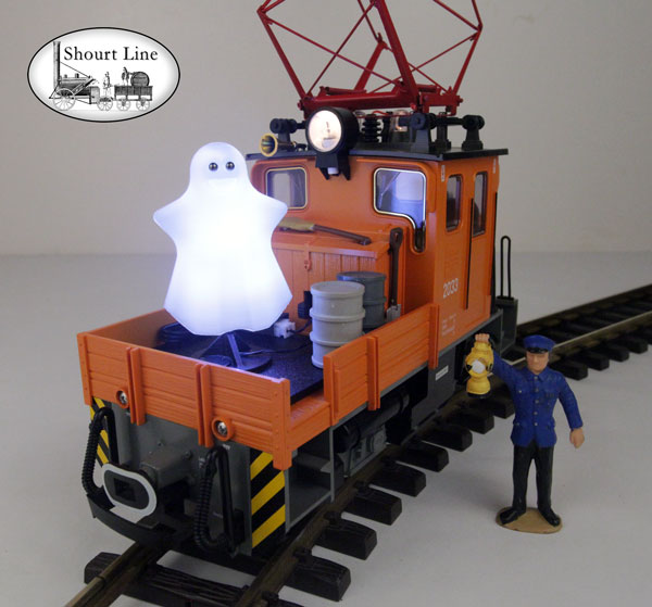 G Scale LGB 2033 Catenary Electric Work Loco and track powered Halloween SL 9821001 Dancing LED Ghost, SL 9907632 A Universal Wired Mounting Platform, and SL LED controller on track and llighted
