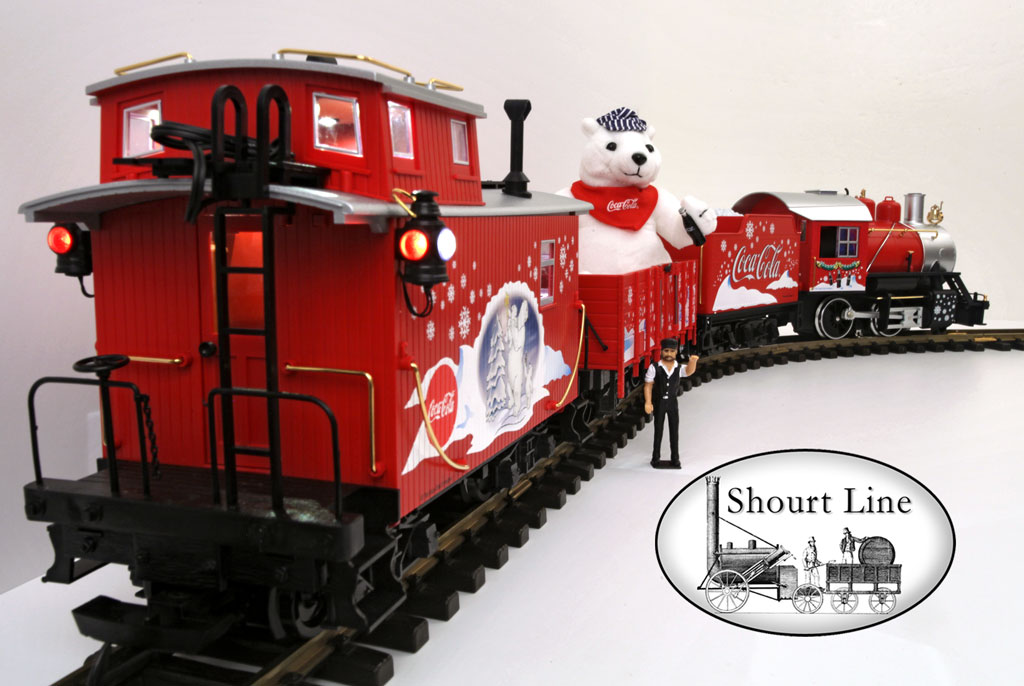 LGB 72510 G Scale Coca Cola Red Trunk Christmas Train Set + SL LED High Efficiency Lighting + 3 Watt Sound system rear right view of train on track