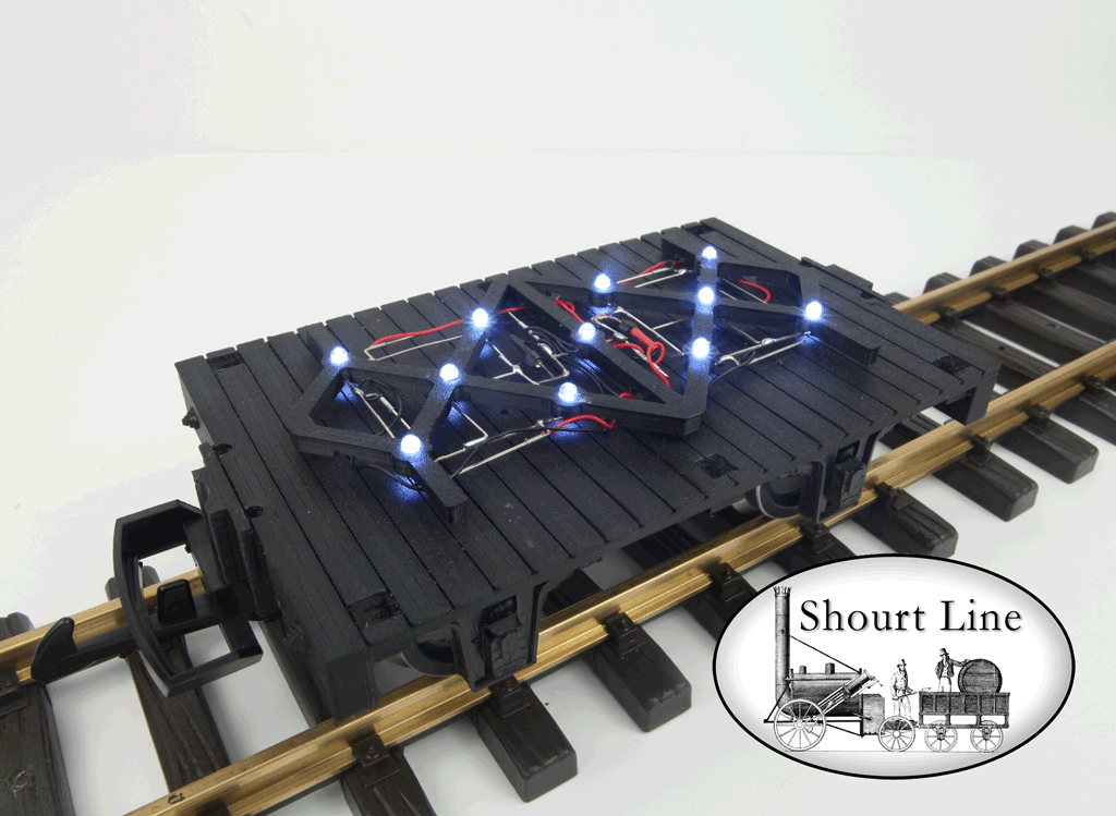 Optional SL 2308111 SL mini-car 11 White LED white fixture for ICE lighting mounted on the base of the car and the SL 2308011 Mini Gondola Ice Load dropped into the top of the gondola