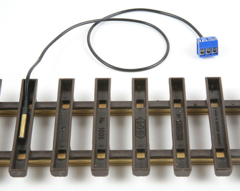 SL TC 17100 placed mounted inside a railroad tie